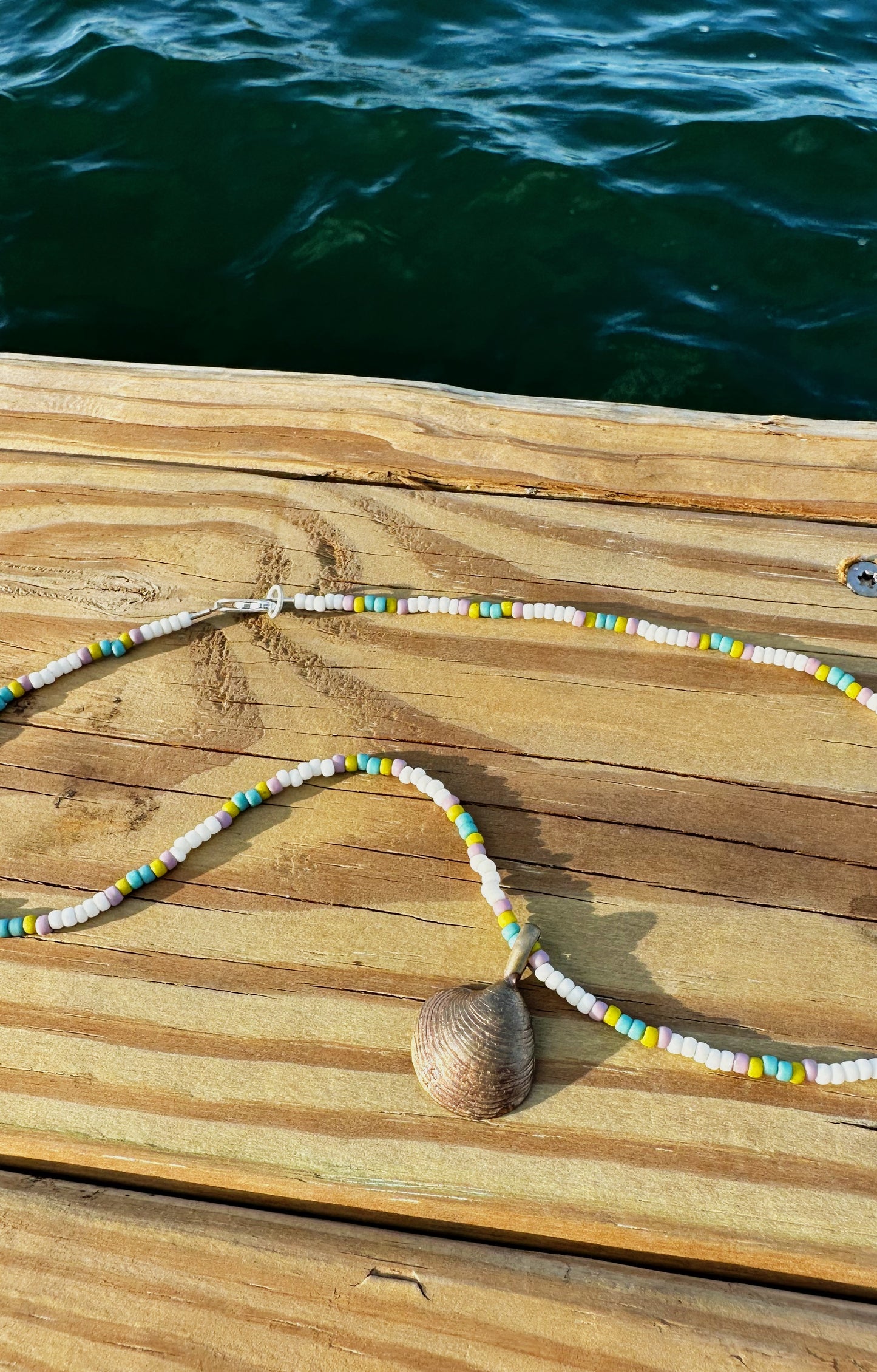Beaded shell charm necklace (bronze)